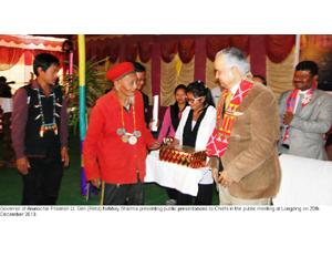 Governor of Arunachal Pradesh Lt. Gen (Retd) Nirbhay Sharma presenting people's presentation to Chiefs at Longding during his visit to Longding District on 20th December 2013.